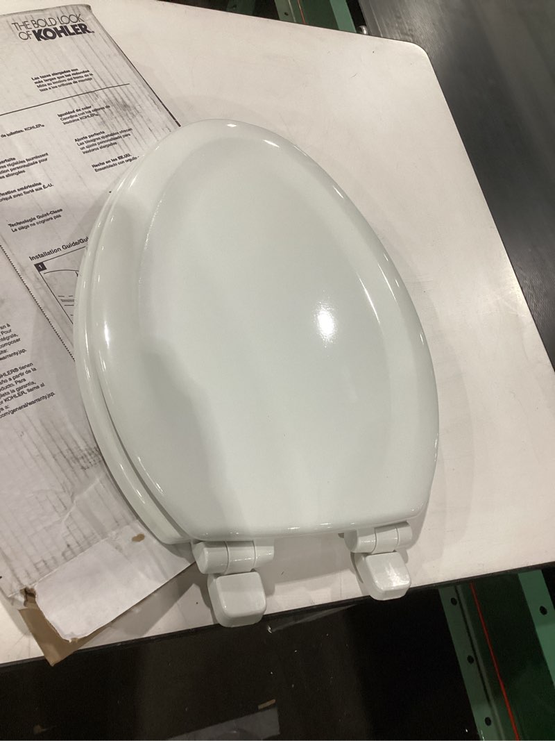 Condition photo showing Good Condition for kohler stonewood quiet-close elongated toilet seat, slow close design, durable wood, easy installation, universal fit, white finish, k-20466-0