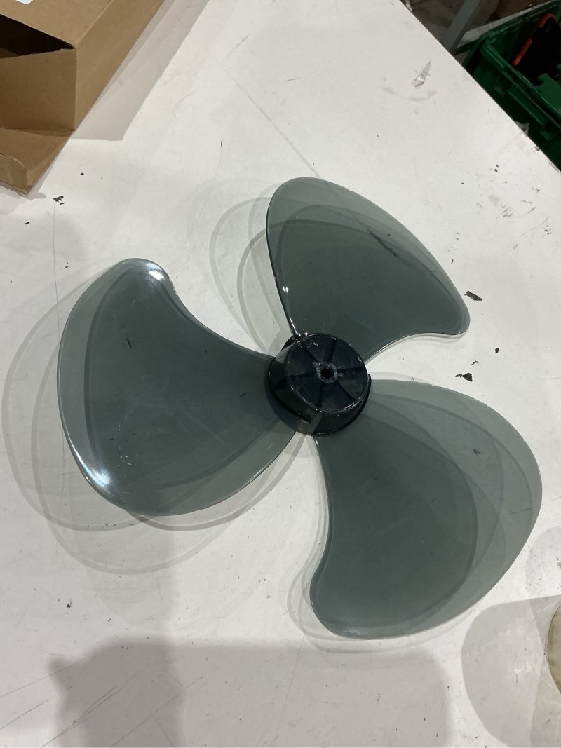 Condition photo showing Good Condition for 16 inch plastic fan blade with nut cover, replacement part for many pedestal, standing and table fans, fan repair accessory for damaged or worn blades