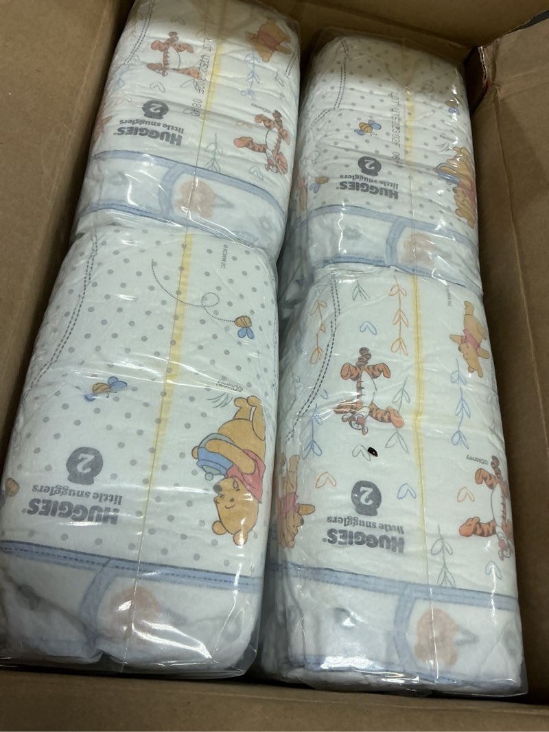 Condition photo showing New/Like New for huggies size 2 diapers, little snugglers baby diapers, size 2 (12-18 lbs), 84 count, packaging may vary size 2 84