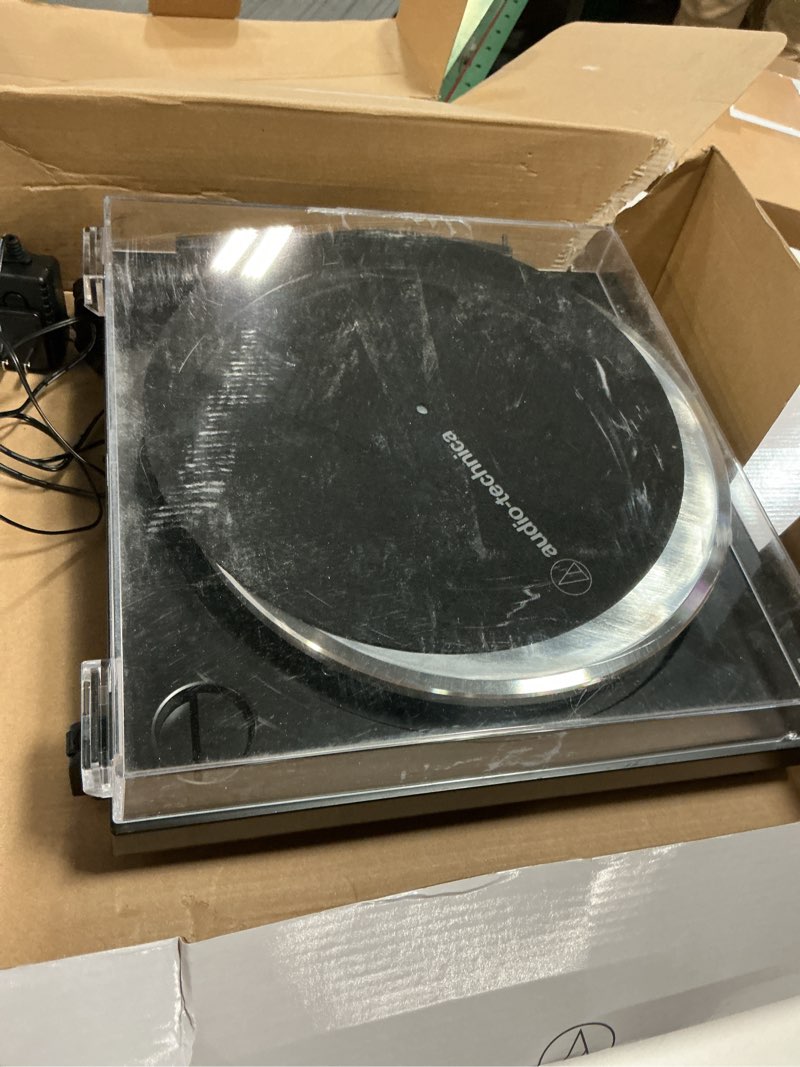 Condition photo showing As Is for Audio-Technica AT-LP60X-BK Fully Automatic Belt-Drive Stereo Turntable, Black, Hi-Fi, 2 Speed, Dust Cover, Anti-Resonance, Die-Cast Aluminum Platter Black Wired Turntable