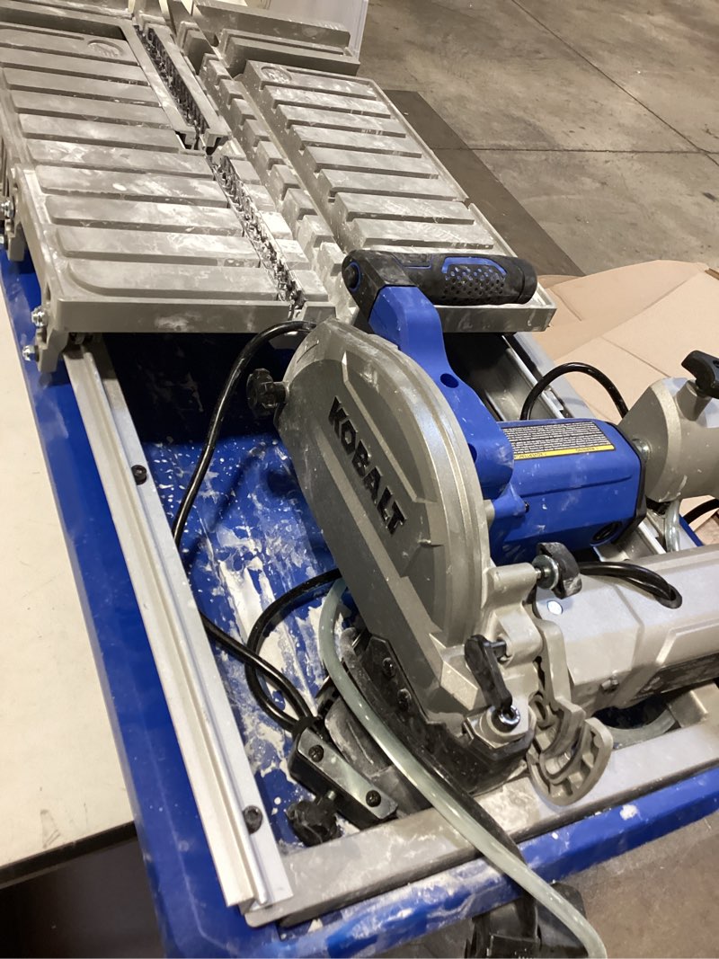 Condition photo showing As Is for kobalt folding head 9 -amp 7-in -blade sliding table tile saw with stand item #5202572 | model #sc1802lw