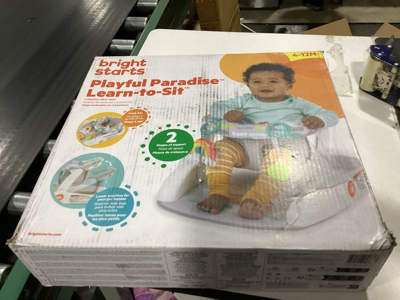 Condition photo showing New/Like New for bright starts learn-to-sit baby floor seat, 2-positions grow with infant, portable baby chair, includes sensory toys, unisex, 4-12 months, playful paradise