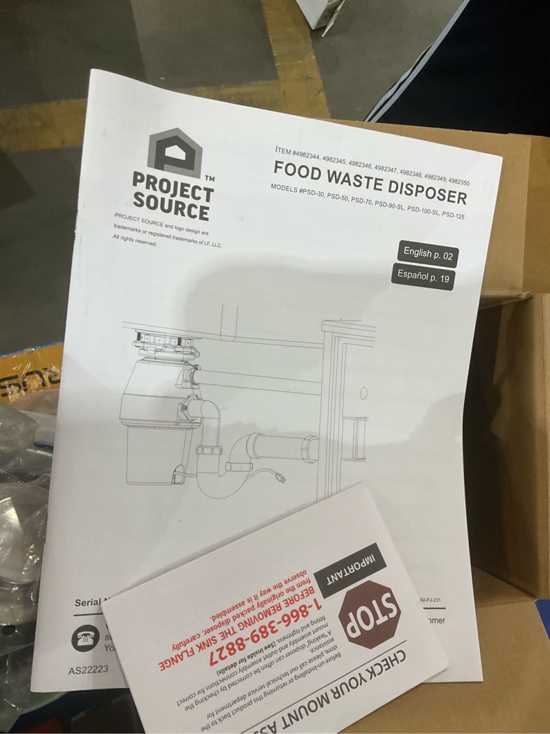 Condition photo showing As Is for project source continuous feed 3/4-hp septic safe corded garbage disposal with noise insulation