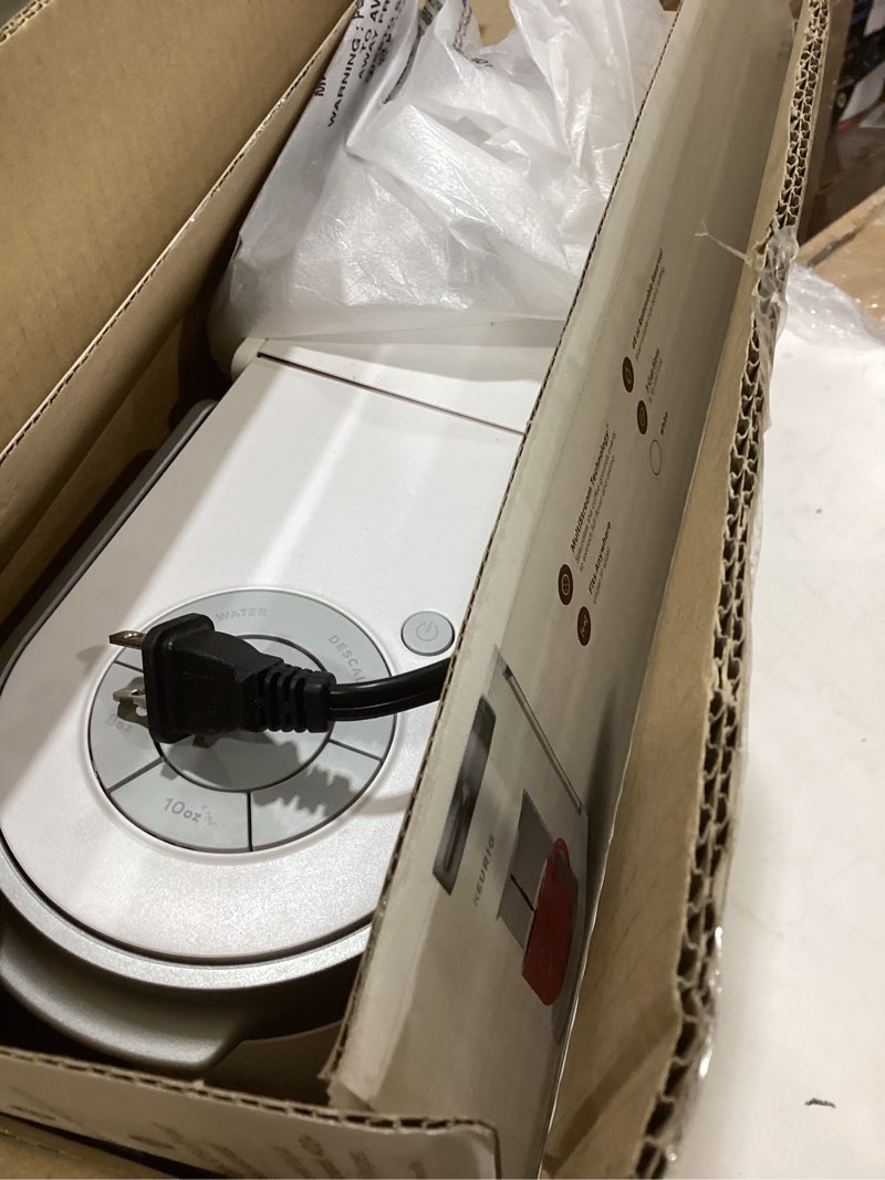 Condition photo showing As Is for keurig k-slim single serve k-cup pod coffee maker, multistream technology, 3 brew sizes, slim and sleek design, 46oz removable reservoir, white