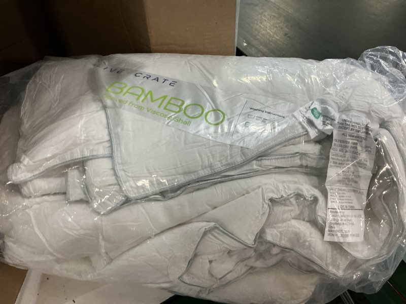 Condition photo showing As Is for olive + crate california king comforter & duvet insert 100% viscose derived from bamboo outer shell - hypoallergenic, cooling & moisture wicking - all season lightweight plush - white - 102 x 90 inchbwhite california