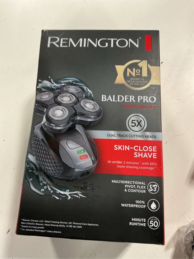 Condition photo showing New/Like New for remington balder pro head shaver  cordless  100% waterproof  black