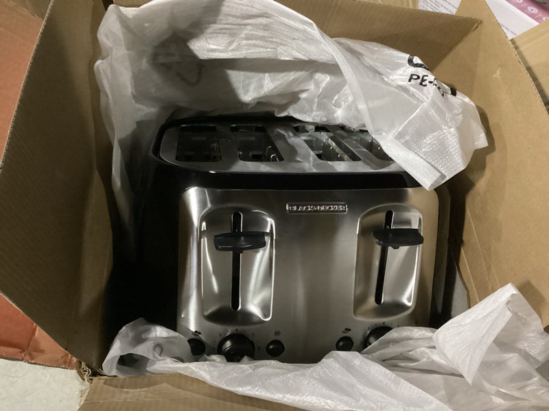Condition photo showing Good Condition for BLACK+DECKER 4-Slice Toaster, Extra Wide Slots, 7 Shade Settings, 1400 Watts, Frozen and Bagel Buttons, Toast Shade Selector, Extra Lift 4-Slice Black
