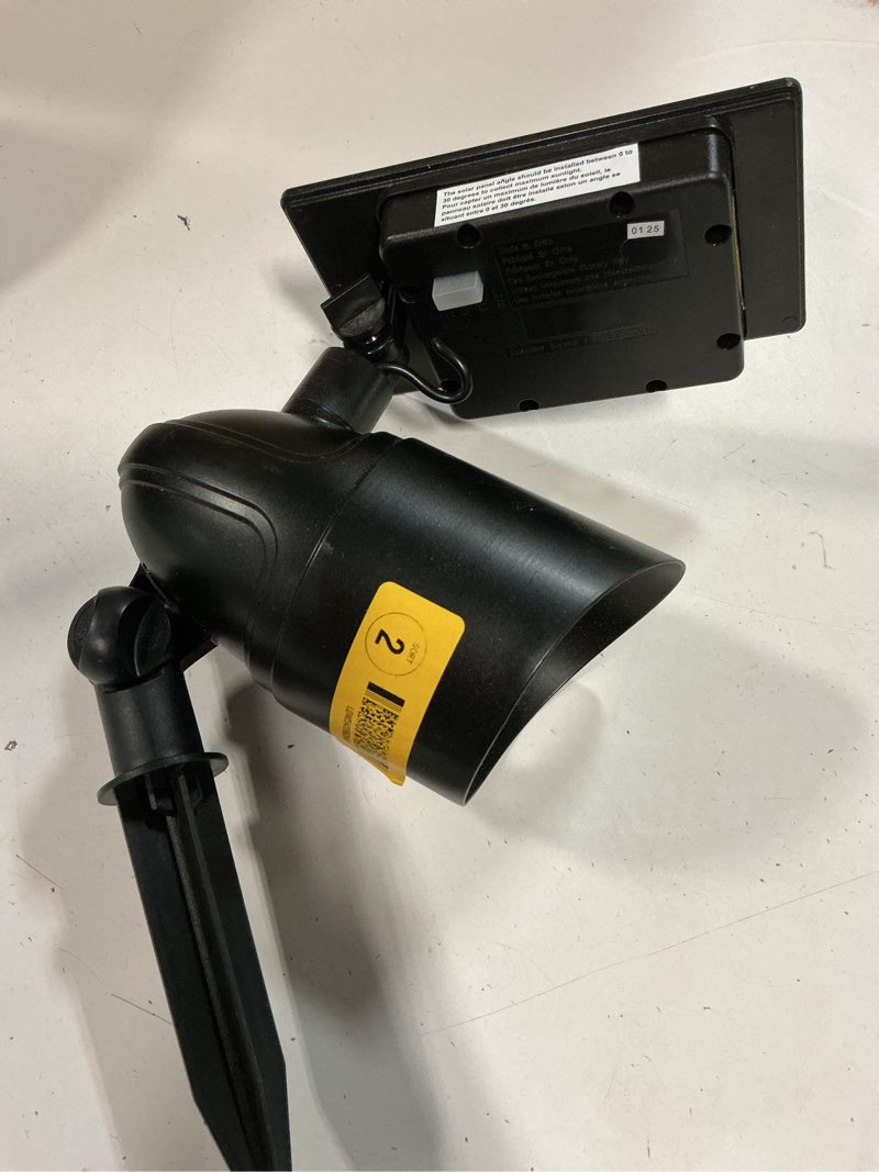 Condition photo showing As Is for harbor breeze 120 -lumens 0.82 -watt black warm white solar led flood light