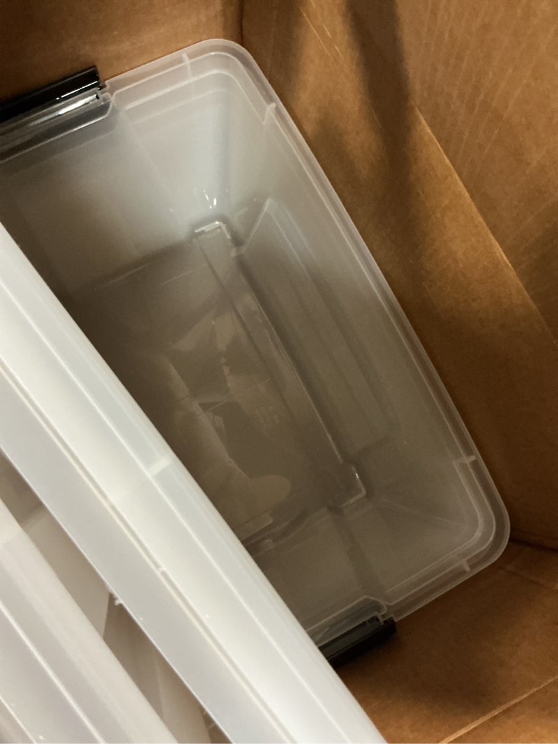 Condition photo showing Good Condition for iris usa 54 qt stackable plastic storage bins with lids, 4 pack - bpa-free, made in usa - see-through organizing solution, latches, durable nestable containers, secure pull handle - clear clear 54 qt 4 pack