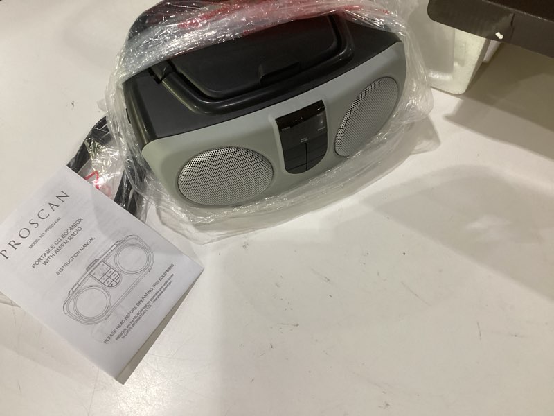 Condition photo showing As Is for proscan cd radio boombox with top-loading cd/cd-r playback  silver  prcd243m, not tested