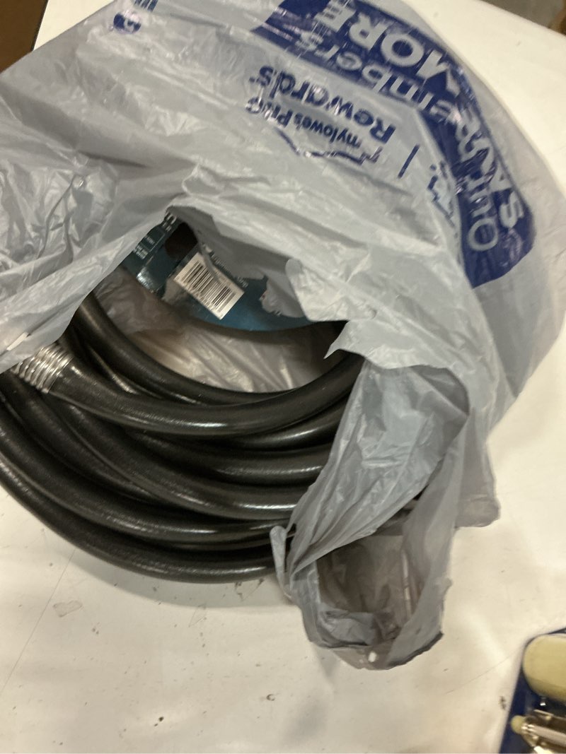 Condition photo showing As Is for NeverKink Teknor Apex 5/8-in x 25-ft Heavy -Duty Kink Free Vinyl Gray Coiled Hose