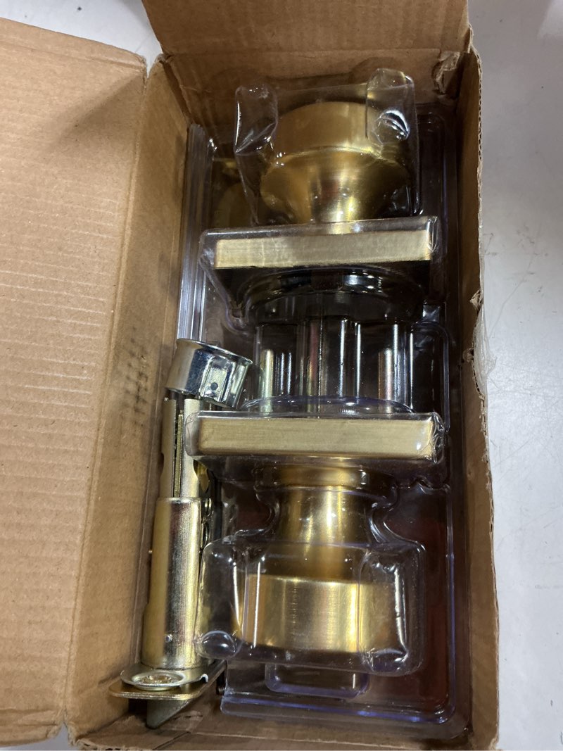 Condition photo showing As Is for kwikset pismo interior passage door knob, handle for closet and hallway doors, non-locking doorknob, satin brass, square, microban protection square rose satin brass