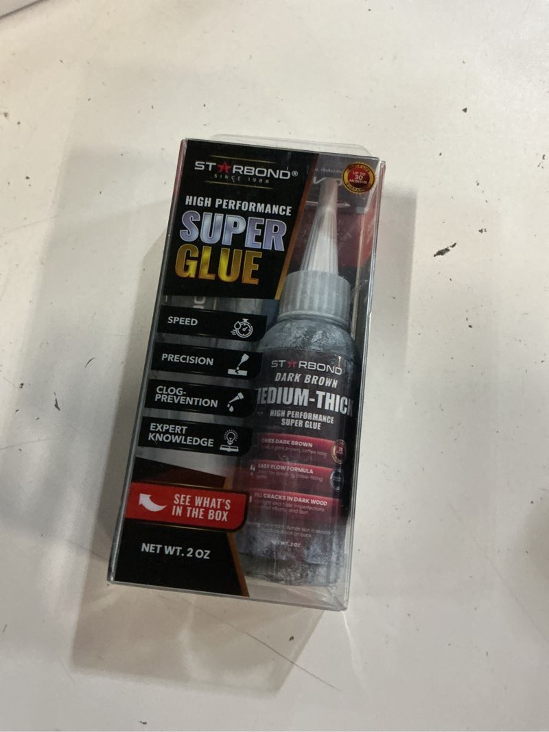 Condition photo showing Good Condition for starbond 2 oz. dark brown medium-thick ca glue (premium cyanoacrylate super glue) knot filler 500 cps viscosity for woodworking, woodturning, carpentry, guitar, rc hobby dark brown 2 ounces medium thick viscosity