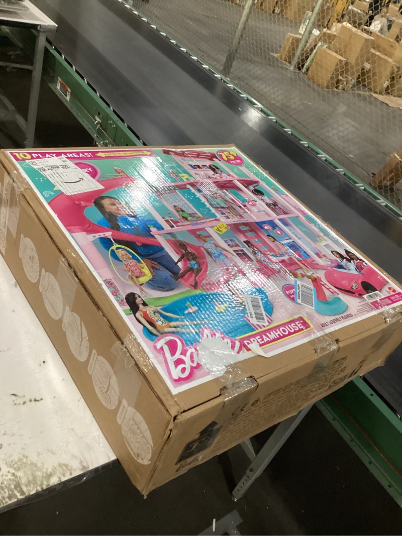 Condition photo showing New/Like New for Barbie Dreamhouse, Pool Party Doll House with 75+ Pieces and 3-Story Slide, House Playset, Pet Eleva