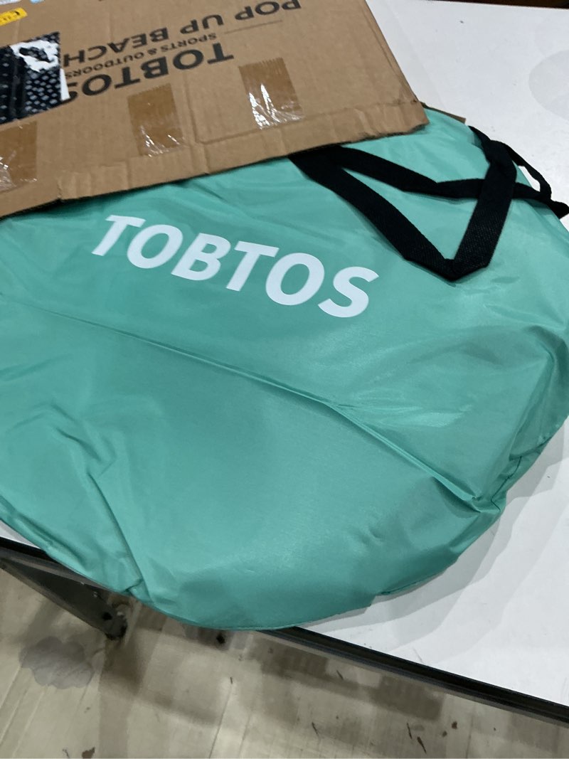 Condition photo showing Good Condition for tobtos upf 50+ pop up beach tent, easy set up beach umbrella, sun shelter for 2-3 people uv protection portable sunshade, baby canopy cabana, lightweight with carry bag mint green for 2-3 person