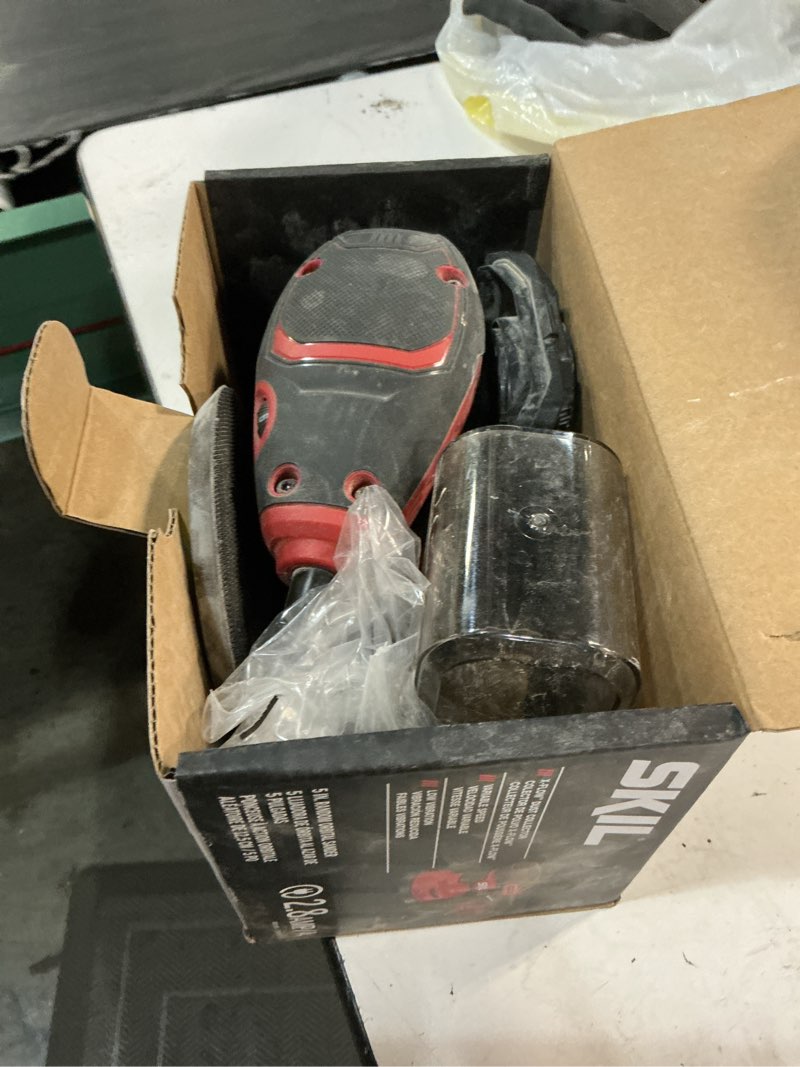 Condition photo showing As Is for skil sr211601 2.8 amp 5 in. corded random orbital sander