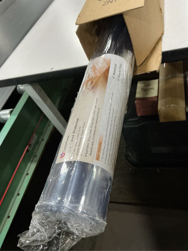 Condition photo showing Good Condition for LovePads Clear Table Cover Protector 40 x 72 Inch, 2mm Thick Plastic Table Cover, Table Protector for Dining Room Table, Waterproof Vinyl Tablecloth Tabletop Pad Mat for Kitchen, Dresser, Writing Desk 40" x 72" Clear 2mm