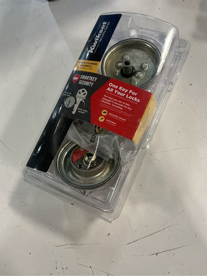 Condition photo showing As Is for kwikset smartkey security antique brass metal single cylinder deadbolt