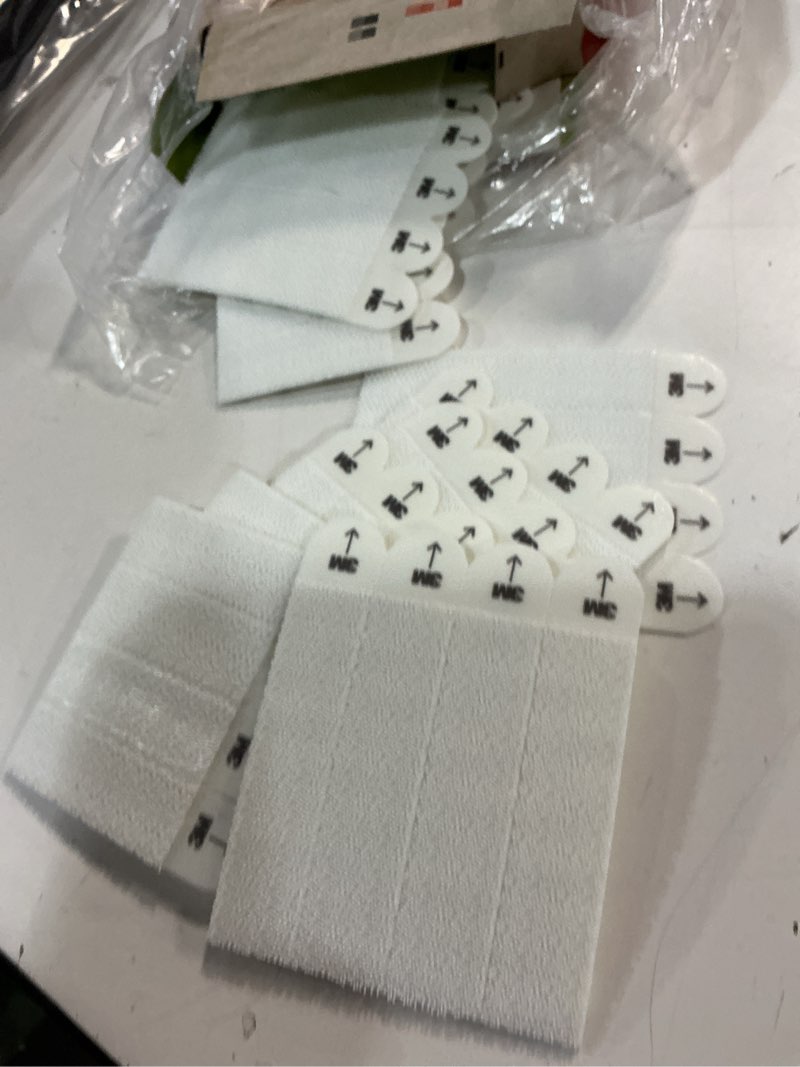 Condition photo showing As Is for Command 15 lb & 10 lb Large and Medium 28 Pairs Picture Hanging Strips (56 Strips), Damage-Free Hangers for Picture Frames, No Tools Required, Great for Home Room Wall Decor, White Adhesive 28 Pairs - 12 Medium/16 Large