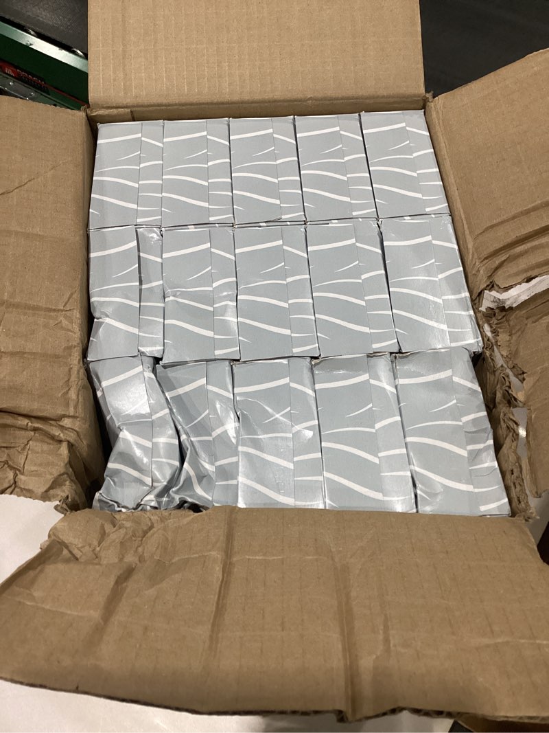 Condition photo showing As Is for Tork facial tissue white *damaged*