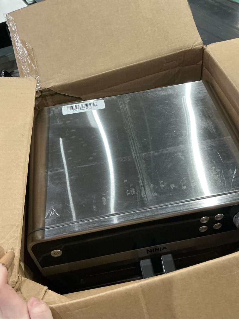 Condition photo showing As Is for ninja | french door premier air fry oven | 10-in-1 functions | 20.3-qt capacity | 5-qt air fry basket, sheet pan, wire rack, broil rack | pfas-free cooking surface, dishwasher-safe accessories | fo101