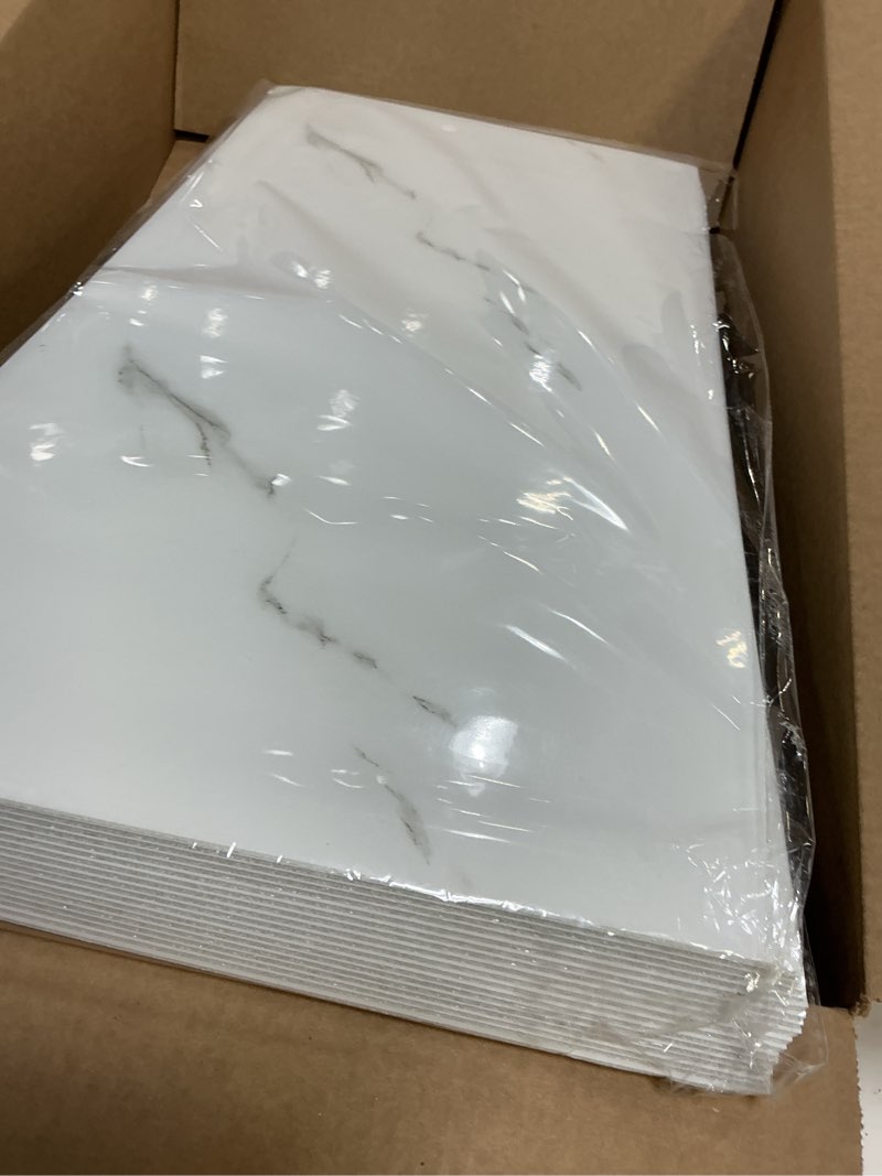 Condition photo showing New/Like New for wadile 23.6"x11.8" waterproof marble peel and stick wall panels marble tile pvc backsplash tiles for kitchen, bathroom, living room, bedroom 20 pack white
