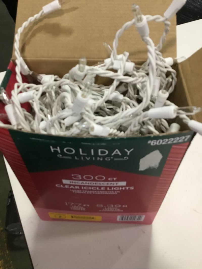 Condition photo showing Good Condition for  indoor/outdoor 300-count incandescent christmas icicle lights, clear, 18', b