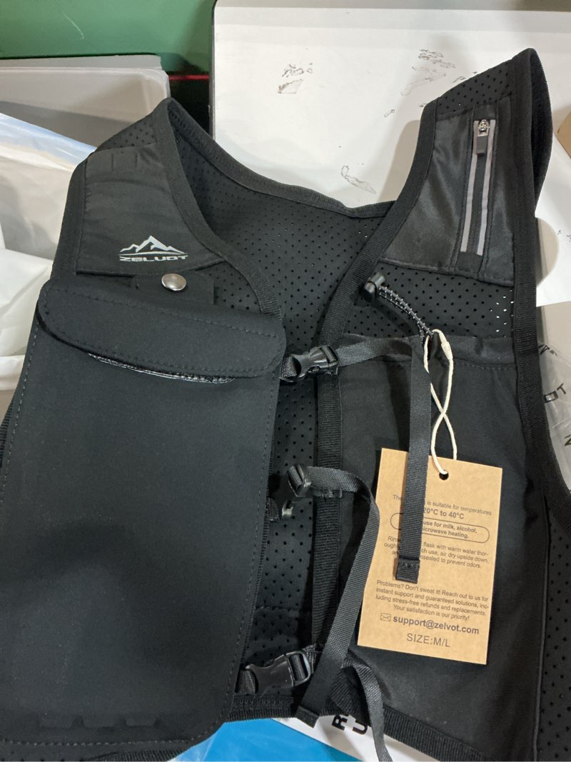Condition photo showing New/Like New for zelvot running vest for women men, usa original patent, adjustable chest straps running hydration vest with 500ml soft flask, lightweight reflective hydration backpack for marathon black medium-large