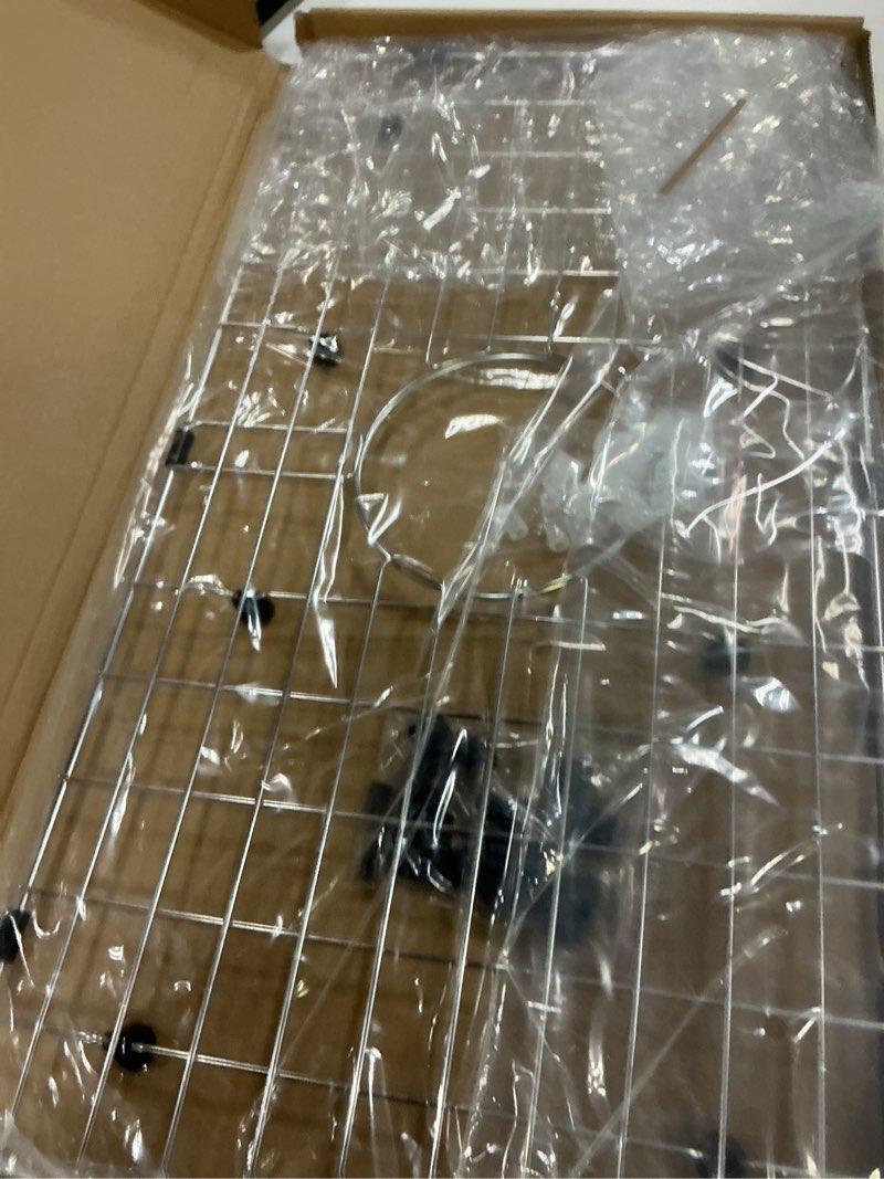 Condition photo showing New/Like New for serene valley sink bottom grid 24-1/8" x 12-5/8", centered drain with corner radius 1-1/2", sink protector nlw2412c