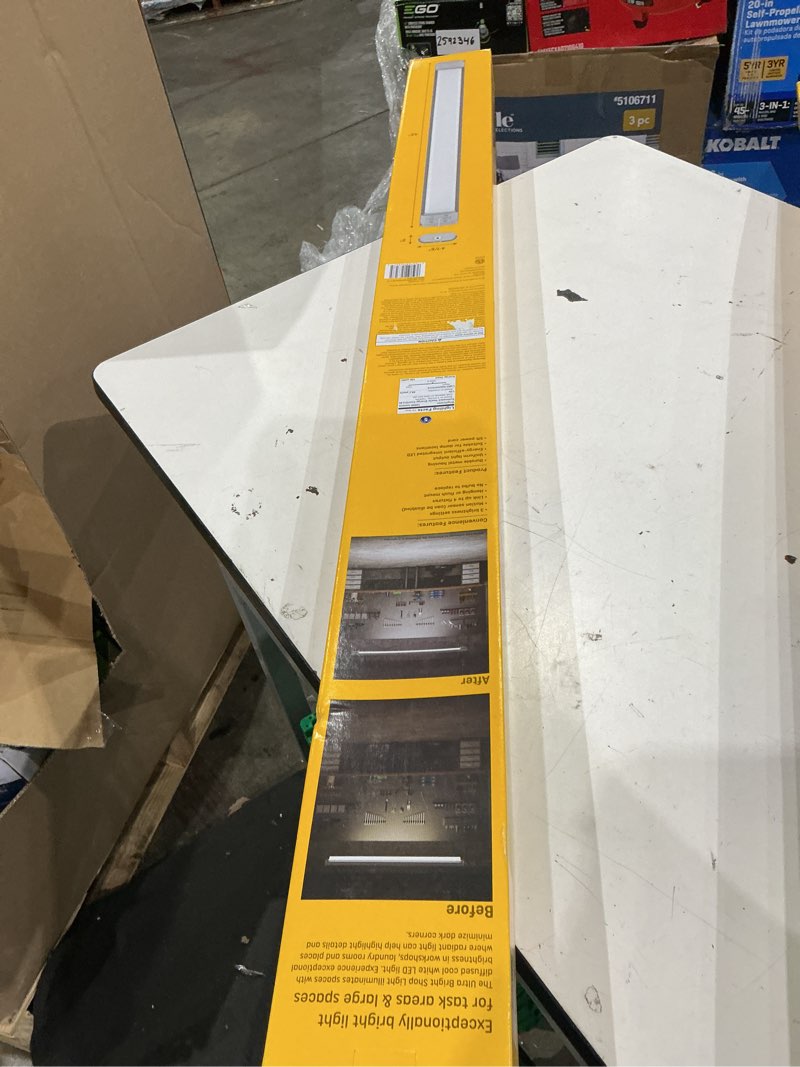 Condition photo showing As Is for ge 4-ft 10000 lumens white cool white led linear garage shop light