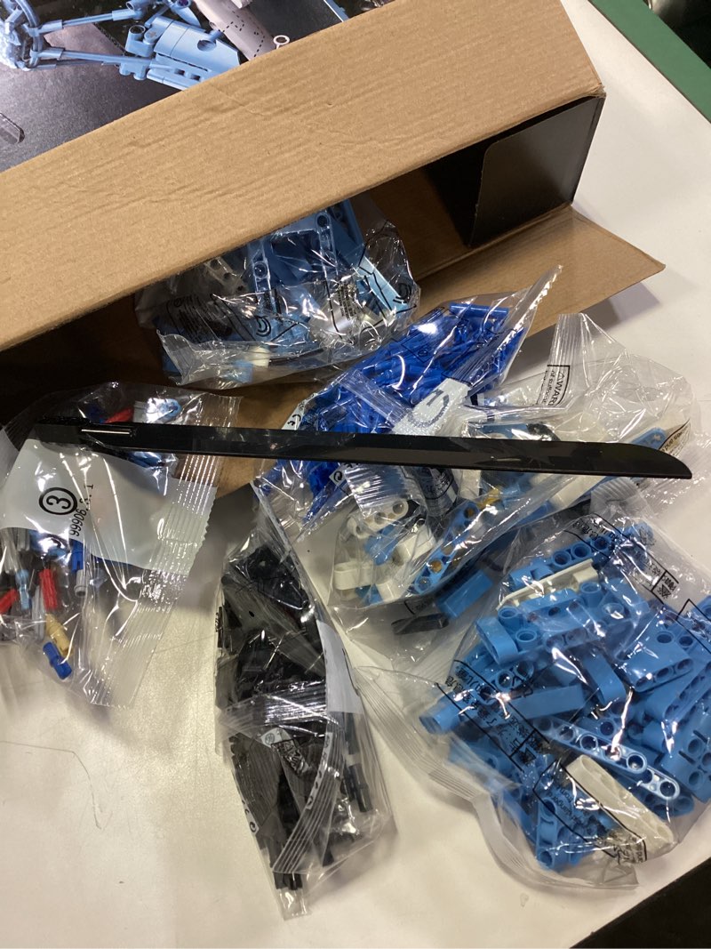 Condition photo showing As Is for Military Helicopter Building Blocks Set, 1521PCS Army Airplane Bricks Model–Air Force Utility Helicopter Toy with Rotating Blades, Detailed Cockpit, Tactical Gear–Collectible Gift for Boys Teen Adults Blue