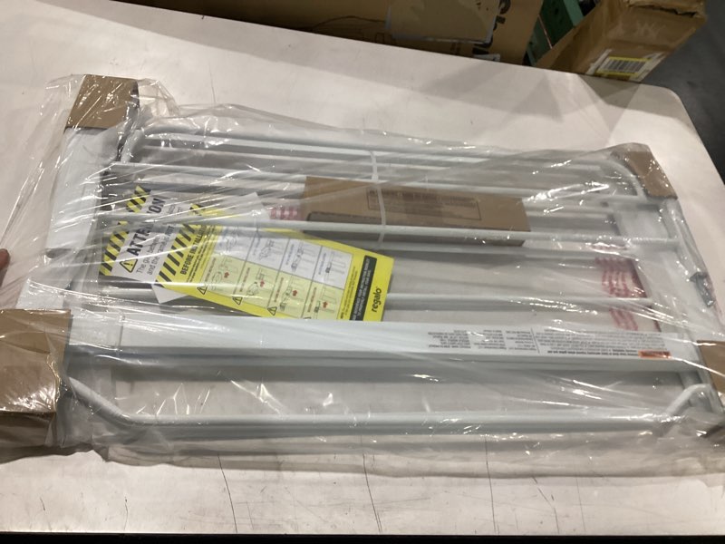 Condition photo showing New/Like New for regalo safety 29-38.5" baby gate for doorways & bottom of stairs, pressure mounted baby gate with door for babies, toddlers & pets, tested & safe for 30 years, american designed, american owned, white white 29-38.5"w x 30"h
