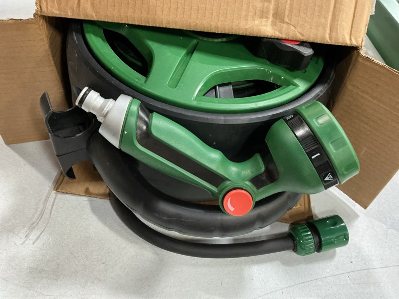 Condition photo showing As Is for 1/2" x 50ft retractable garden hose reel?with 10 patterns spray nozzle?portable heavy duty garden hose holder for garden watering?car & patio washing?pet cleaning?green? green 50ft