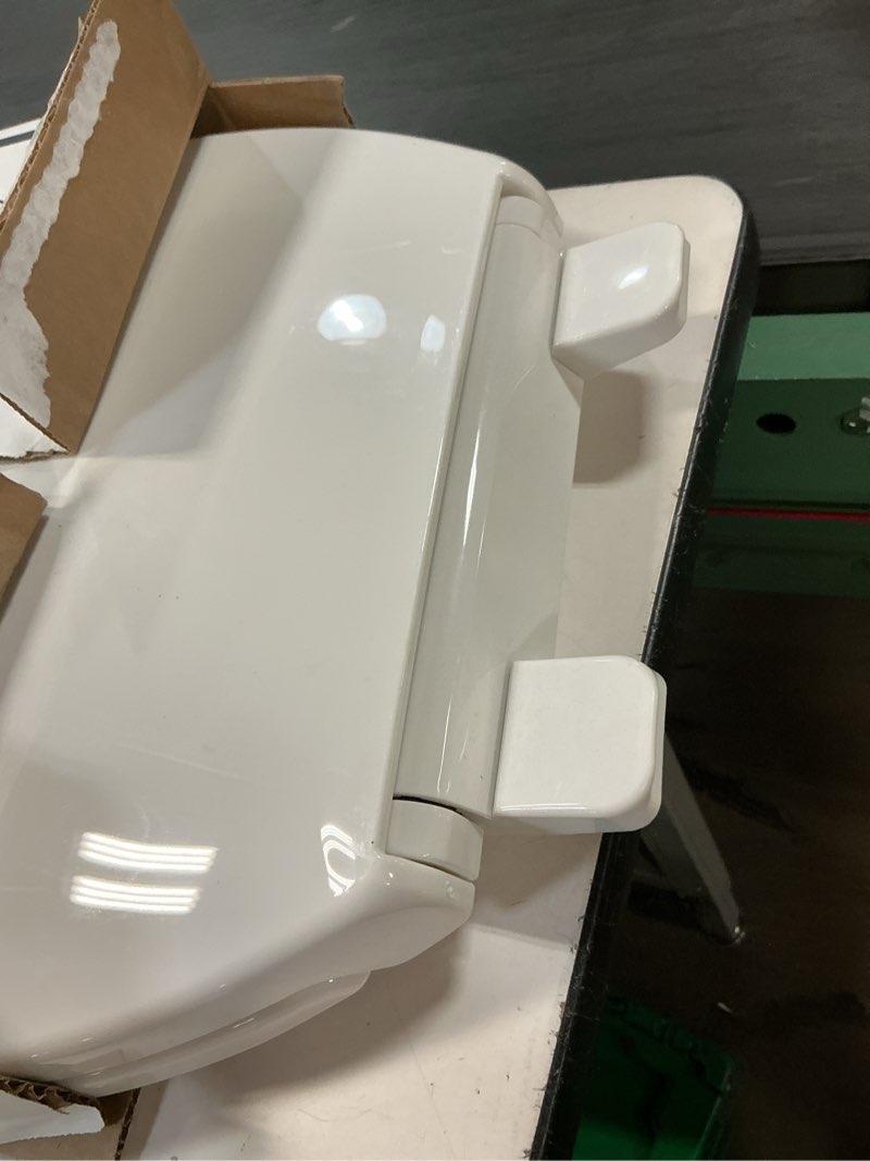 Condition photo showing As Is for kohler k-4774-0 brevia elongated white toilet seat with quick-release hinges and quick-attach hardware for easy clean, white