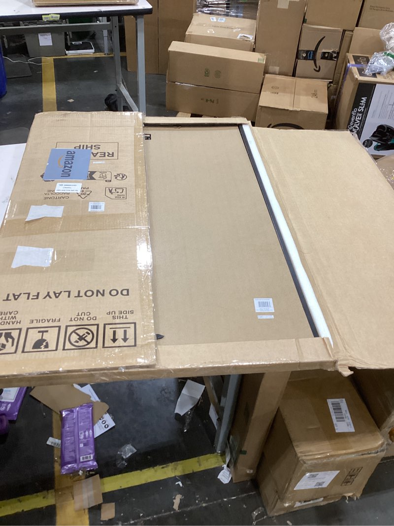 Condition photo showing Good Condition for mcs foundation 24x36 poster frame traditional brass, vertical & horizontal wall hanging large picture frame for photos, posters & art prints (1-pack) 1-pack brass 24x36