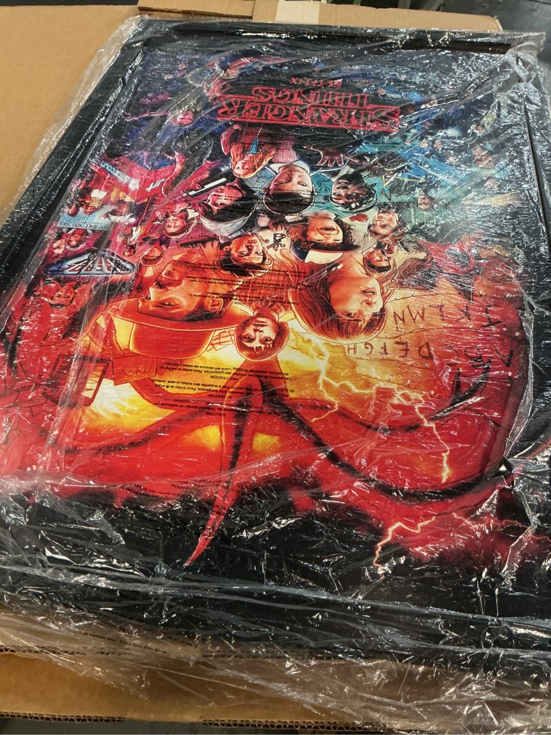 Condition photo showing Good Condition for Netflix Stranger Things - Three Seasons One Sheet Wall Poster, 34L" x 22.4W", Black Framed Version Black Framed Version 34"L x 22.4"W