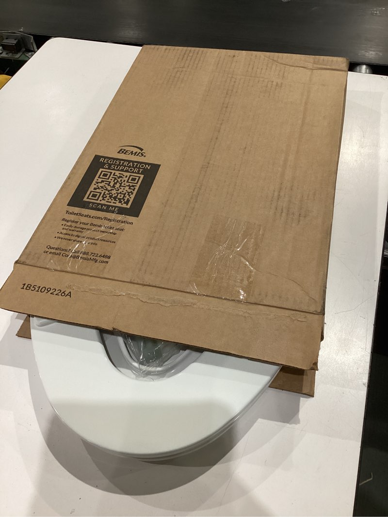 Condition photo showing As Is for mayfair nextstep2 toilet seat with built-in potty training seat, slow-close, removable that will never loosen, elongated, white elongated 2-in-1 toilet seat