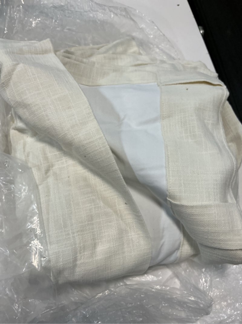 Condition photo showing As Is for quince textured cotton true blackout curtain, 48x84, ivory