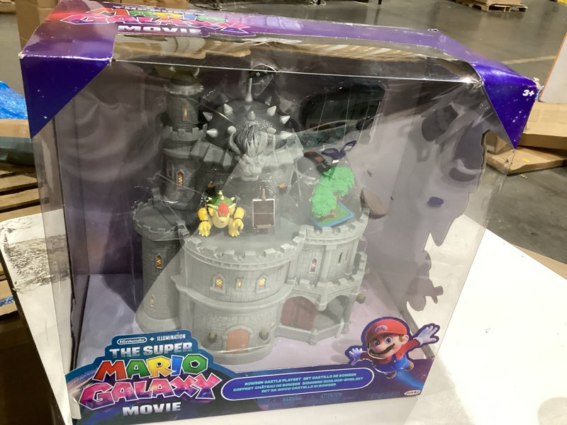 Condition photo showing Good Condition for the super mario galaxy movie – 12" deluxe three-story bowser castle playset with 1.5” bowser figure, piano, bonsai tree, heat-activated paintings and more!