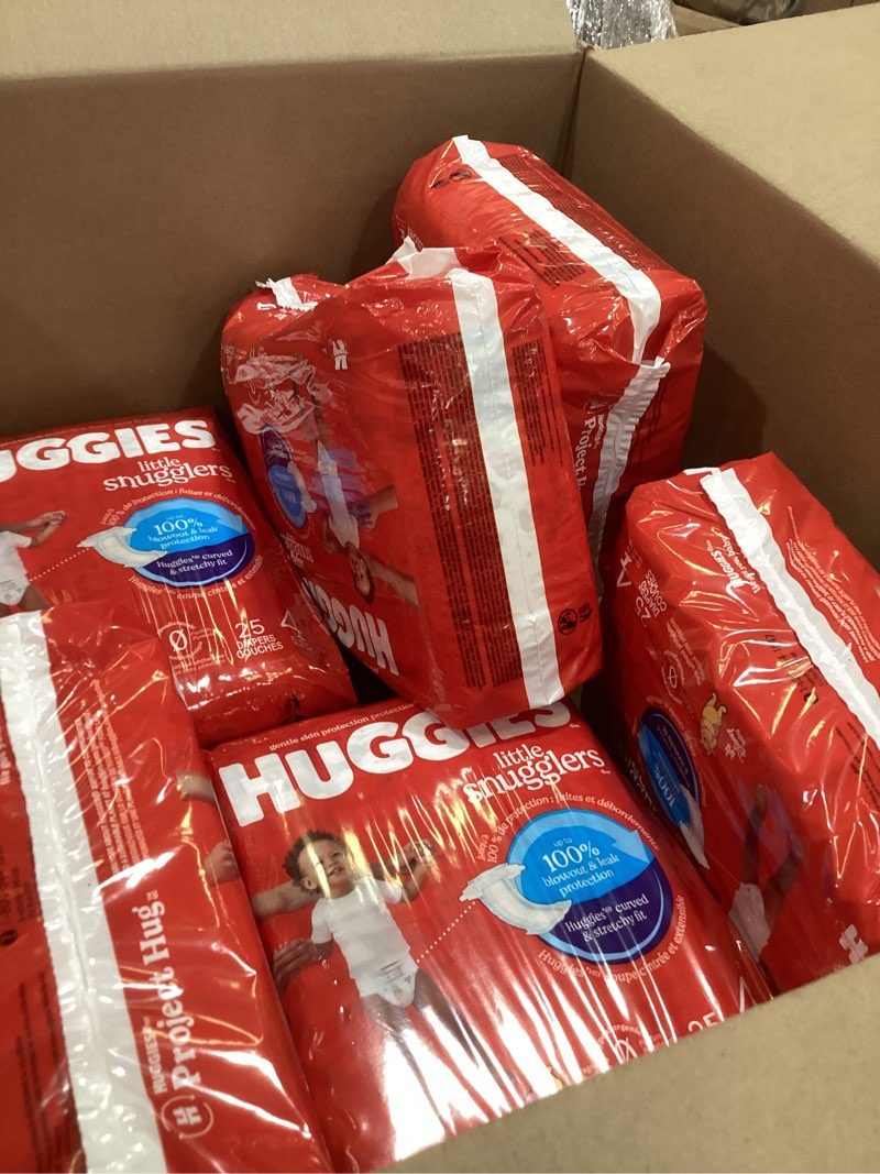 Condition photo showing Good Condition for huggies size 4 diapers, little snugglers baby diapers, size 4 (22-37 lbs), 150 count (6 packs of 25), packaging may vary size 4 150
