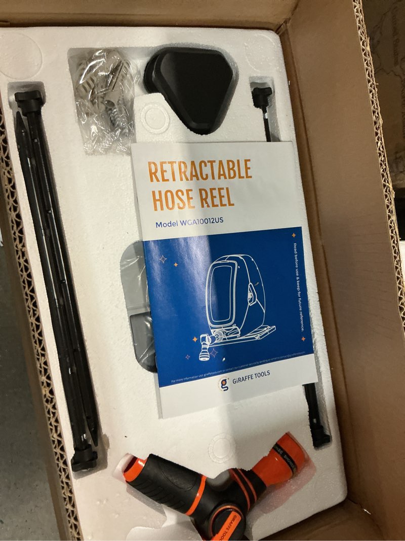 Condition photo showing Good Condition for giraffe tools retractable hose reel with 1/2 inch x 100ft, heavy duty ground mount garden hose reel, automatic rewind,with 9-function sprayer nozzle & flexible swivel base 100 ft 1/2 inch
