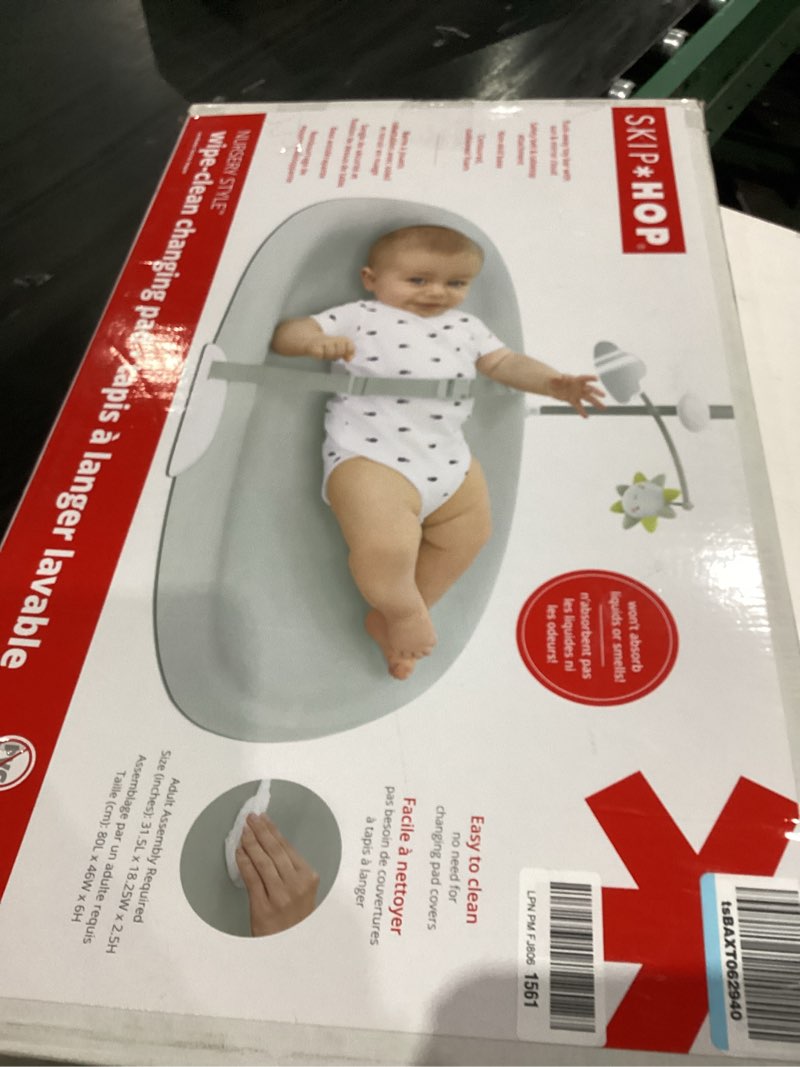 Condition photo showing As Is for Skip Hop Baby Changing Pad Nursery Style Wipe-Clean Contoured with Cushioned Foam, Non-Skid Base, Built-in Safety Belt & Tuck-Away Toy Bar, Grey 18" Grey