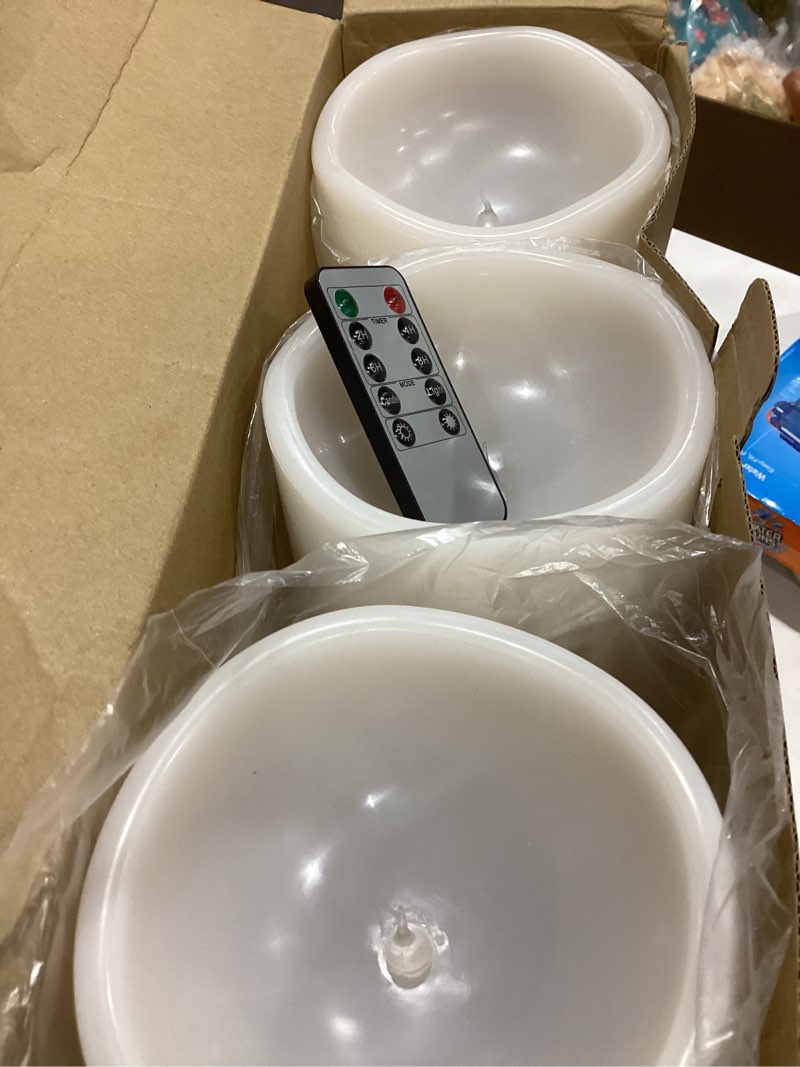 Condition photo showing Good Condition for 10" 12" 14" x 5" extra large waterproof outdoor flameless candles battery operated led pillar candles for indoor outdoor lanterns, off white, long lasting, set of 3 off-white 10" 12" 14" x 5"