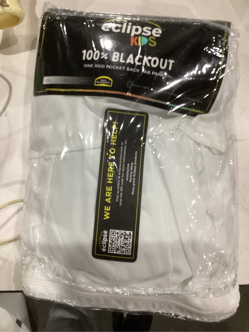 Condition photo showing Good Condition for Eclipse Blackout Curtain, Tiered Ruffle Kids Curtain, 84 in x 40 in, Thermaback 100% Blackout Curtain with Rod Pocket Header, Curtain for Kids Room or Playroom, 1 Window Curtain, White White Ruffle 40"W x 84"L (Pack of 1)