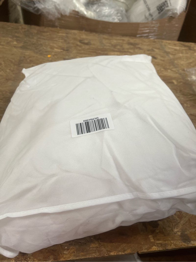 Condition photo showing New/Like New for lightweight premium down comforter, full/queen, down