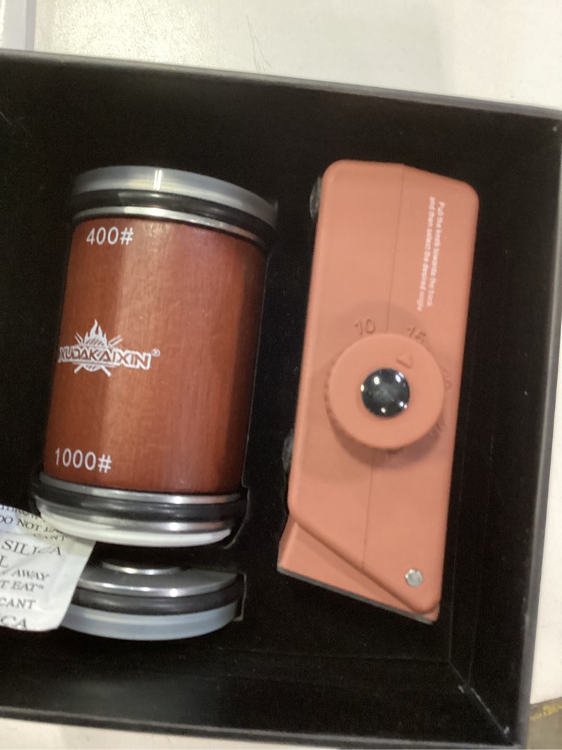 Condition photo showing Good Condition for the innovative knife sharpener - patented multi-angle premium rolling knife sharpener with extra replacement head for chef's, fruit, and all steel knives (brown)