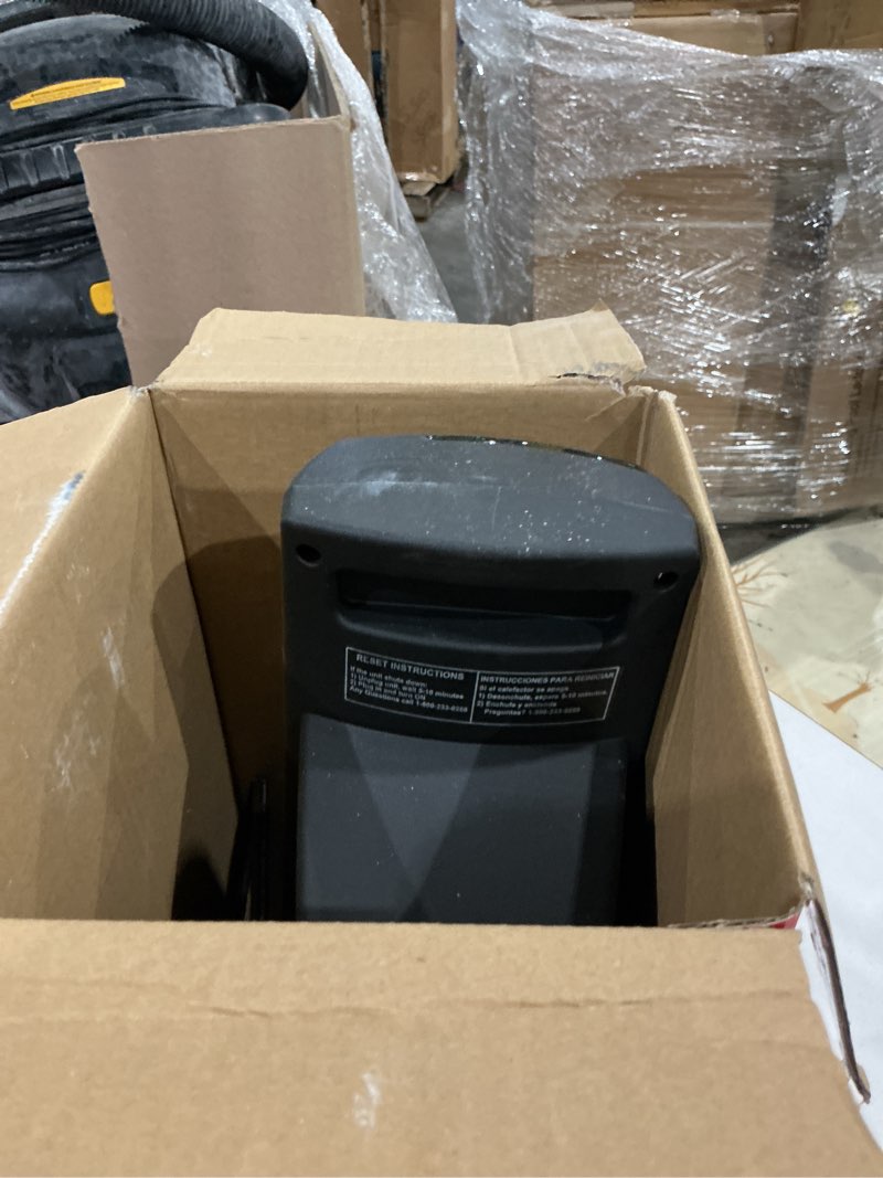 Condition photo showing As Is for lasko 1500w oscillating ceramic tower electric space heater with remote, ct22835, black, new