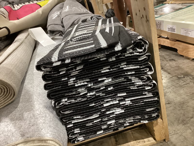 Condition photo showing As Is for milleloom boho 10x20 waterproof outdoor rug, reversible plastic straw mat, tribal geometric washable
