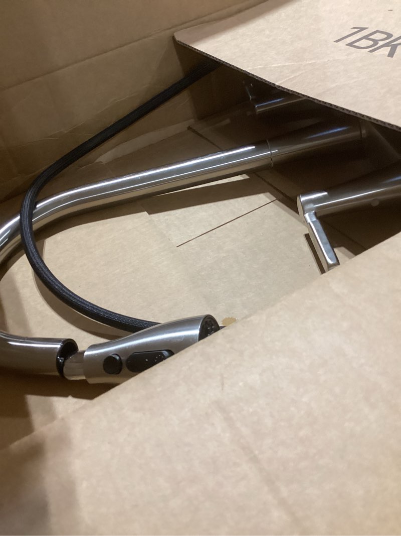 Condition photo showing As Is for project source stainless steel double handle deck-mount pull-down kitchen faucet with sprayer