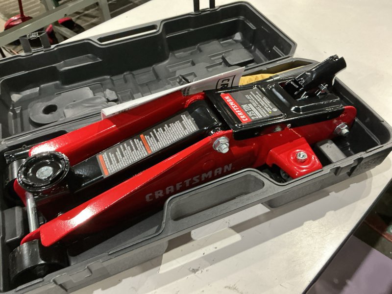 Condition photo showing As Is for craftsman black 2.25-ton steel hydraulic trolley jack